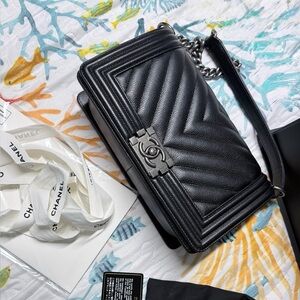 CHANEL Black Chevron Crossbody Bag